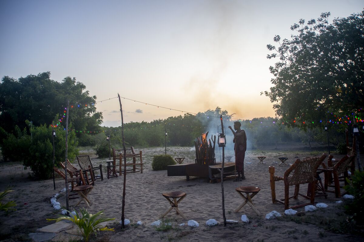 The deck set for dinner at Cterra Saadani, at the end of the day