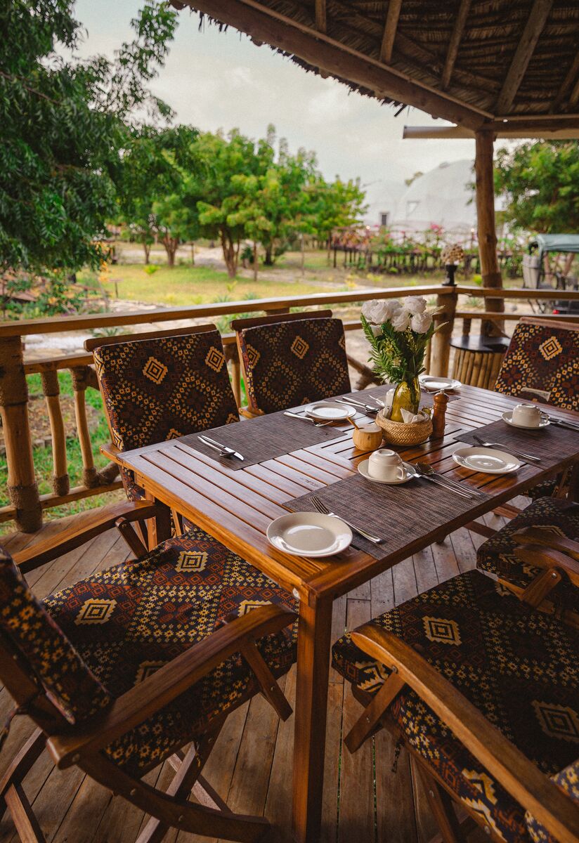 The table and the camp — Where you eat, where you sit and what the camp looks like when it is being used.