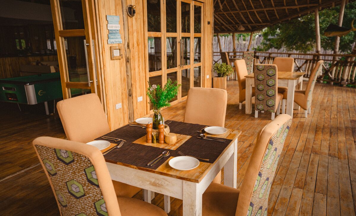 The table and the camp — Where you eat, where you sit and what the camp looks like when it is being used.