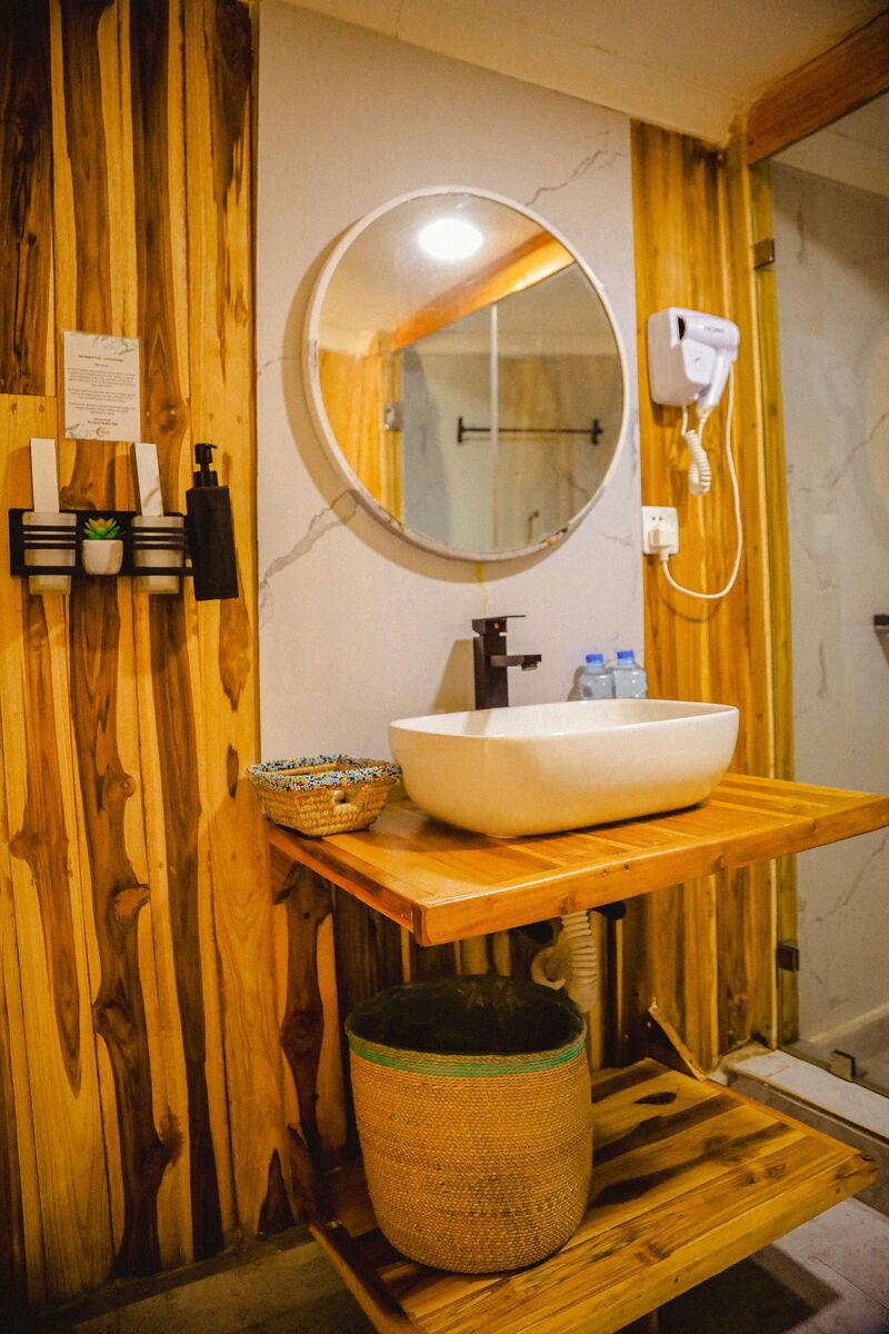 The bathrooms — Basins, mirrors, showers and WCs inside the domes.